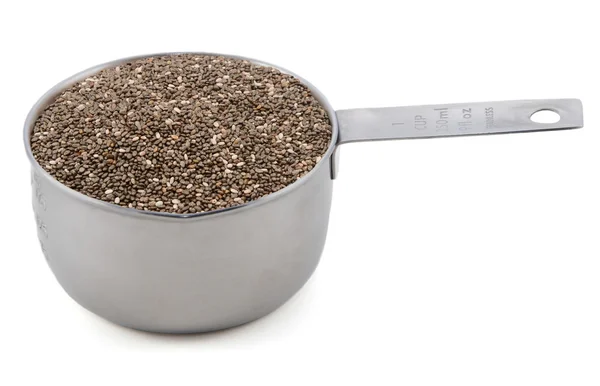 Chia seeds in a cup measure — Stock Photo, Image