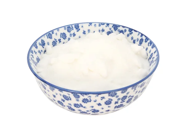 파란색과 흰색 도자기 그릇에 흰 캐스터 설탕 — 스톡 사진