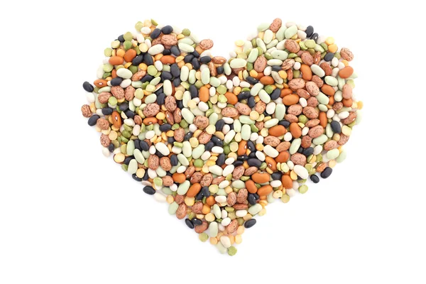 Mixed dried beans in a heart shape — Stock Photo, Image