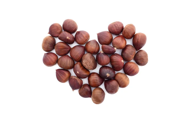 Chestnuts in a heart shape — Stock Photo, Image