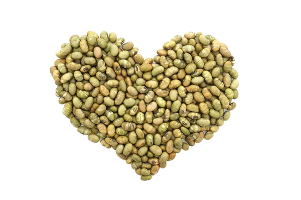 Roasted salted soy nuts in a heart shape — Stock Photo, Image