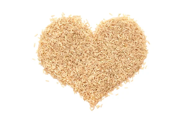 Long grain brown rice in a heart shape Stock Photo