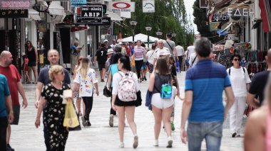 Ohrid, Macedonia - 28 Aug, 2019: Crowd people on street of Tzar Samuil (Car Samuilo) during summer vacation