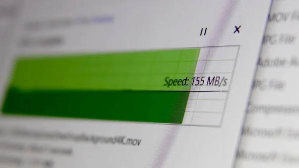 Copy a File Folder on Server Cloud with high internet speed. Closeup of Transfer progress bar showing a speed in Mbs