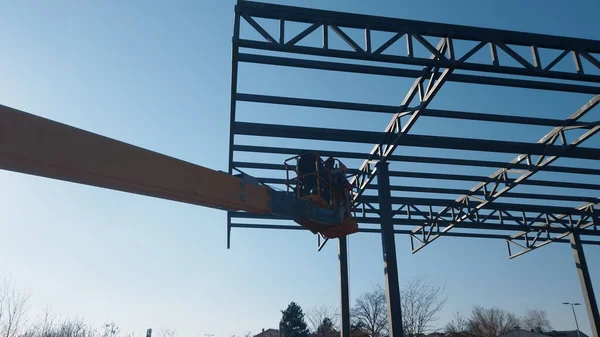 Hochsitz Rosinenpflücker Mit Rigger Auf Baustelle — Stockfoto