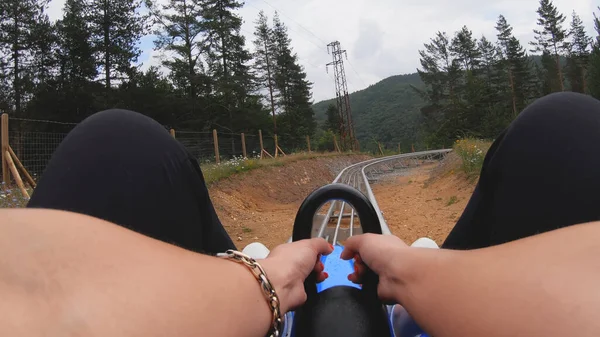 Pov Leg Woman Having Adrenaline Ride Rail Roller Coaster Green — Stock Photo, Image