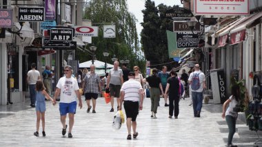 Ohrid, Macedonia - 28 Aug, 2019: Busy shopping walkway street in old town of Ohrid, Macedonia, slow motion