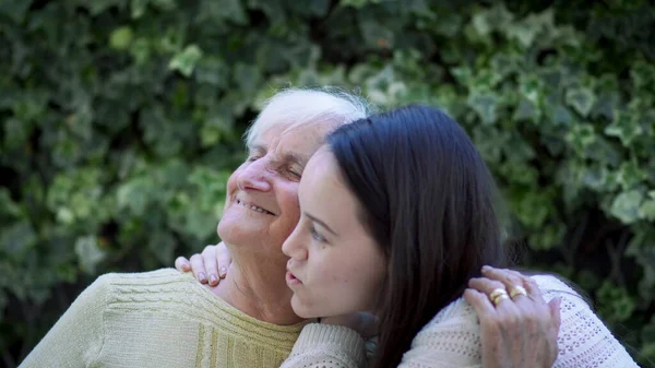 Girl Hug Elderly Grandmother Slow Motion — Stock Photo, Image