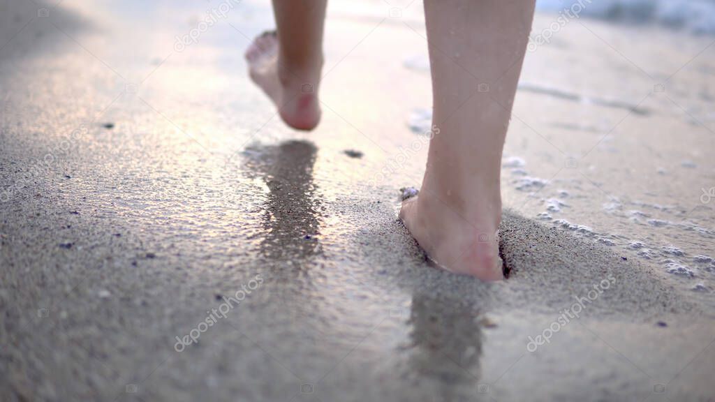 Woman walking on a beach