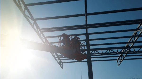 Hochsitz Rosinenpflücker Mit Rigger Auf Baustelle — Stockfoto