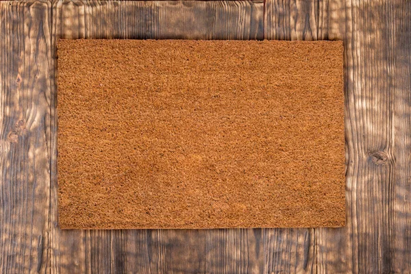 Natürliche Kokos Fußmatte Auf Antikem Holz Textur Hintergrund — Stockfoto