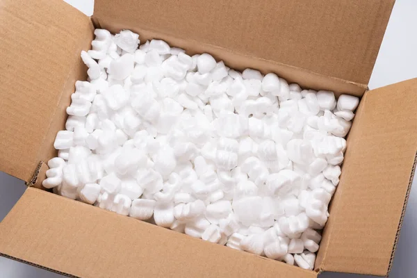 Lot Loose White Filler Shipping Packing Peanuts Cardboard — Stock Photo, Image