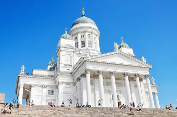 Tourist visiting Helsinki cathedral on June 22, 2013. is the Finnish Evangelical Lutheran cathedral of Helsinki, is located in the centre of Helsinki. — Stock Photo, Image