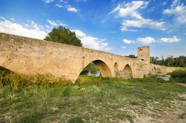 Scenic view of an ancient stone medieval bridge at dusk in Frias, Castilla y Leon, Spain. — Stock Photo, Image