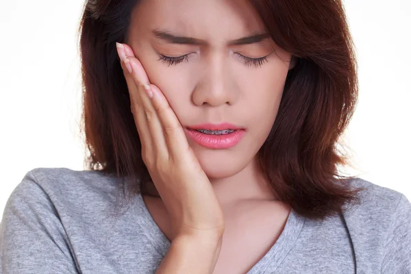 Mulher dor de dente no fundo branco — Fotografia de Stock