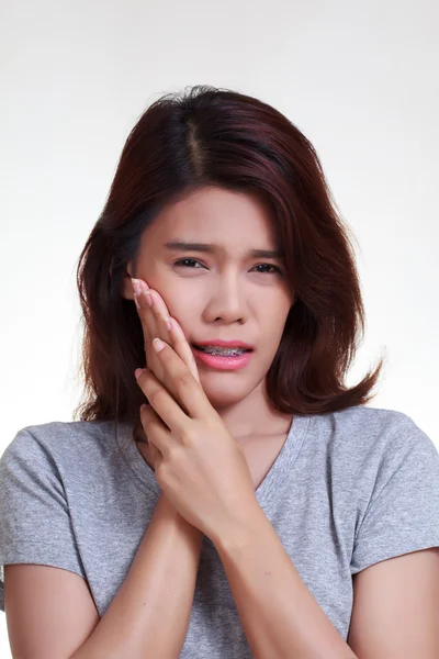 白い背景の上の女性の歯痛 — ストック写真