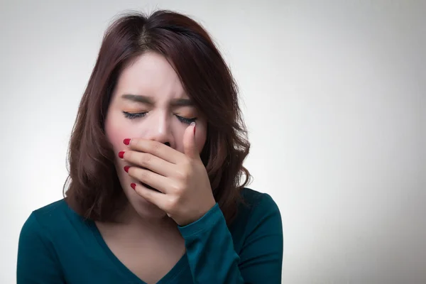 Woman yawning on white background — Stock Photo, Image