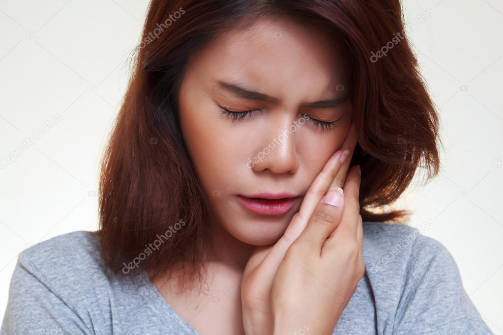 woman toothache on white background