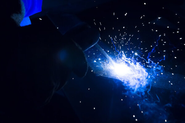 Arc welder with welding sparks