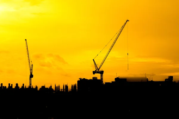 Construction cranes silhouettes — Stock Photo, Image