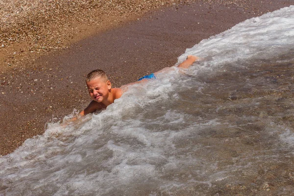 Tanned Short Haired Nine Year Old Boy Swims Sea Plays — Stock Photo, Image