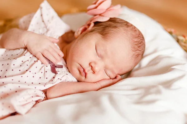 Sleeping Two Week Old Baby Girl Golf Course Pink Dress — Foto de Stock