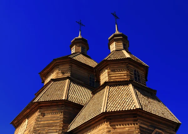Дерев'яна церква охоплює Пресвятої Богородиці Стокове Зображення