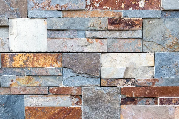 Eine Wand Aus Mittelgroßen Bis Großen Farbigen Steinen Einer Detaillierten — Stockfoto