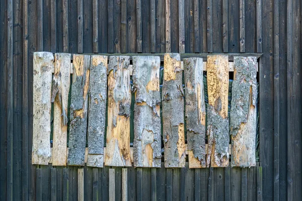 Wooden wall oriented vertically with a hammered window Substrate, texture ready for further processing