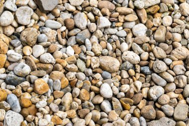 Küçük taşlardan oluşan çakıl dokusu düzensiz olarak düzenlenmiş düz taş. Kabartma dokusu
