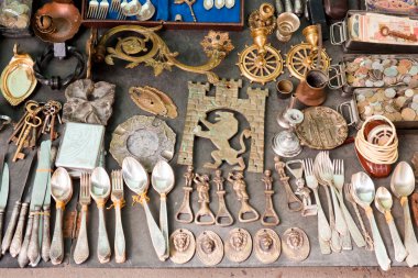 Various things for sale on a flea market clipart