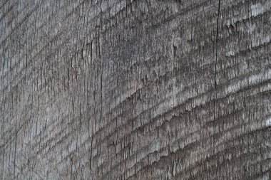 Koyu bir çiğ levhanın dokusu. Ahşap bir yüzeyin pürüzlü yapısı. Arkaplan.