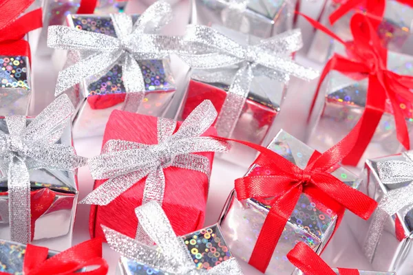 Top view of silver and red gifts close-up — Stock Photo, Image