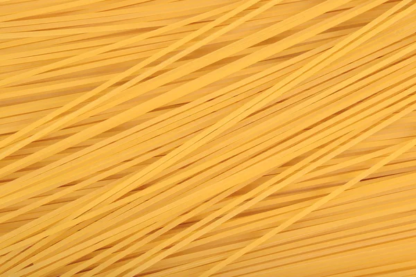 Sfondo pasta italiana cruda spaghetti — Foto Stock