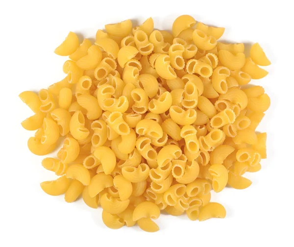 Montón de pasta italiana sin cocer rigate en un blanco — Foto de Stock