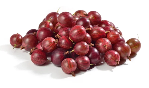 Heap of fresh red gooseberry close up on a white — Stock Photo, Image