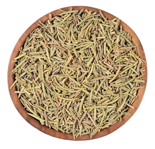 Dried rosemary in a wooden bowl on a white — Stock Photo, Image