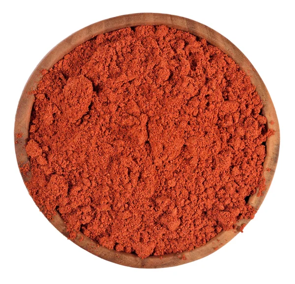 Ground paprika in a wooden bowl on a white — Stock Photo, Image