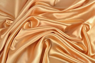 Arka plan altın saten kumaştan