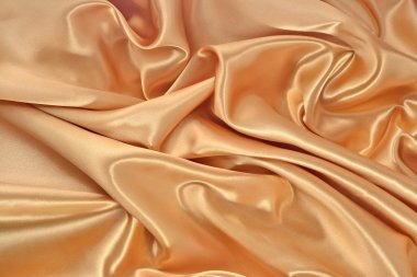 Arka plan altın saten kumaştan