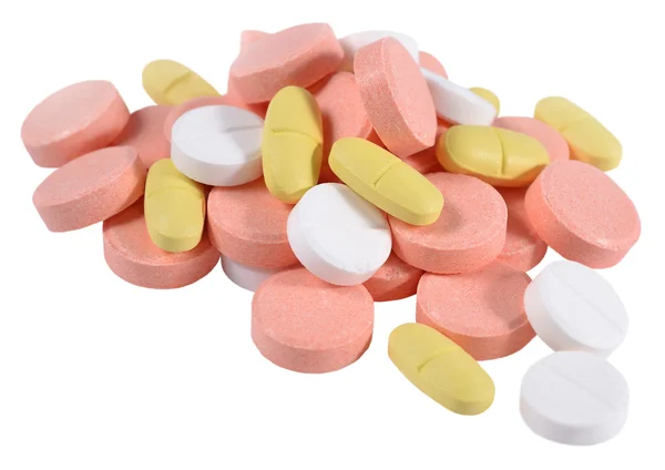 Heap of colorful pills on a white — Stock Photo, Image