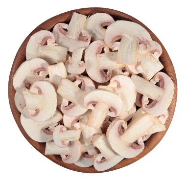 Bir beyaz tahta bir kase dilimlenmiş mantar 