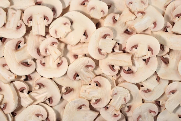 Sliced mushrooms as background — Stock Photo, Image