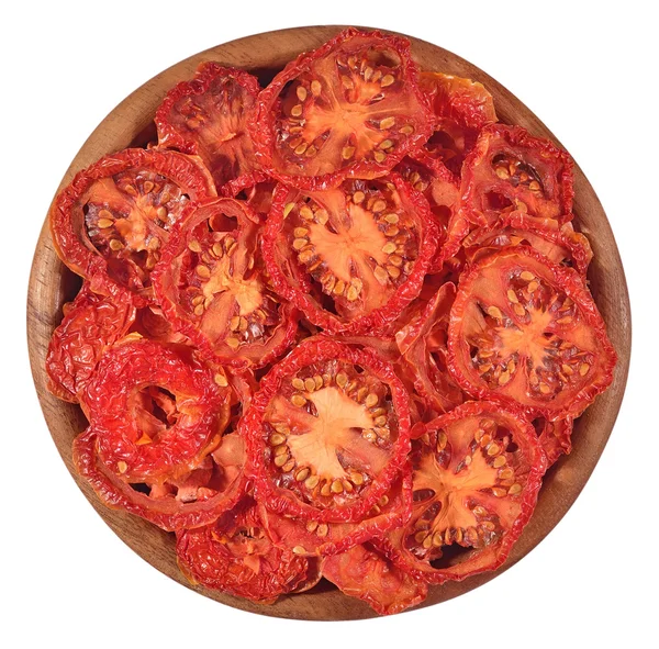 Dried tomatoes in a wooden bowl on a white — Stock Photo, Image