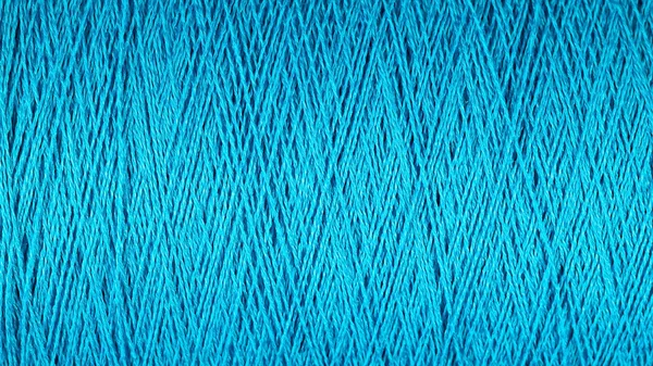 Spool of blue thread macro background — Stock Photo, Image