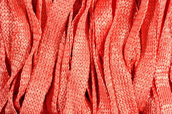 Orange stockinet ribbons background — Stock Photo, Image