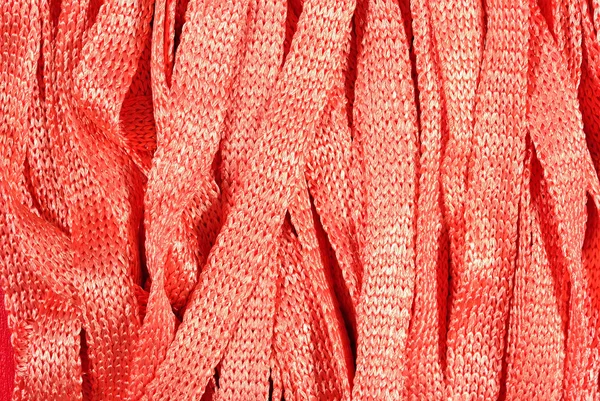 Orange stockinet ribbons background — Stock Photo, Image