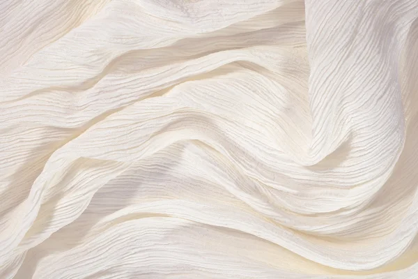 Crumpled white fabric close up — Stock Photo, Image