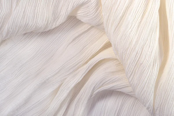 Crumpled white fabric close up — Stock Photo, Image