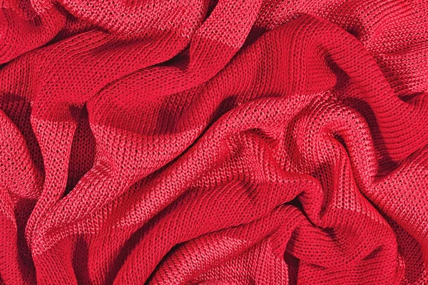 Red crumpled stockinet background — Stock Photo, Image